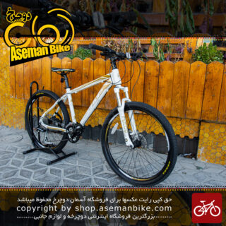 دوچرخه کوهستان کافیدیس مدل 6200 پرو سایز 26 با سیستم دنده ی 24 سرعته شیمانو رنگ سفید طلایی Cofidis MTB Bicycle Model No.6200 Pro Size 26 24 Speed White Gold